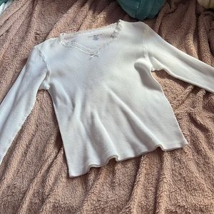 Brandy Melville white long sleeve shirt. lace v-neck with bow.